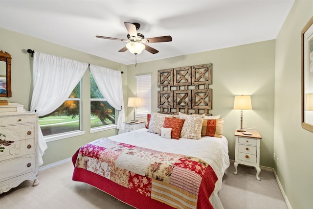 109 Lost Spur, Horseshoe Bay, TX 78657 - carpeted bedroom featuring baseboards and a ceiling fan