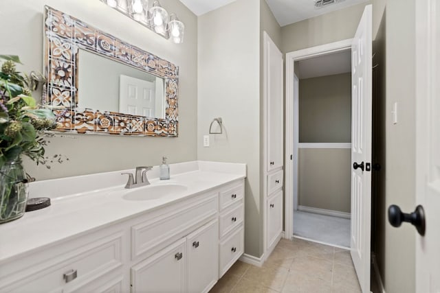 109 Lost Spur, Horseshoe Bay, TX 78657 - bathroom featuring vanity, baseboards, tile patterned flooring, and visible vents