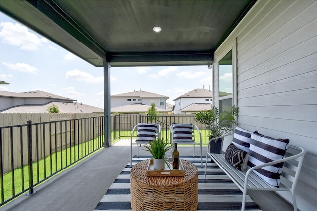 balcony featuring a residential view