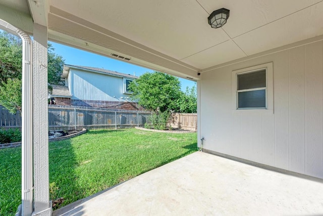 view of yard featuring a patio and a fenced backyard
