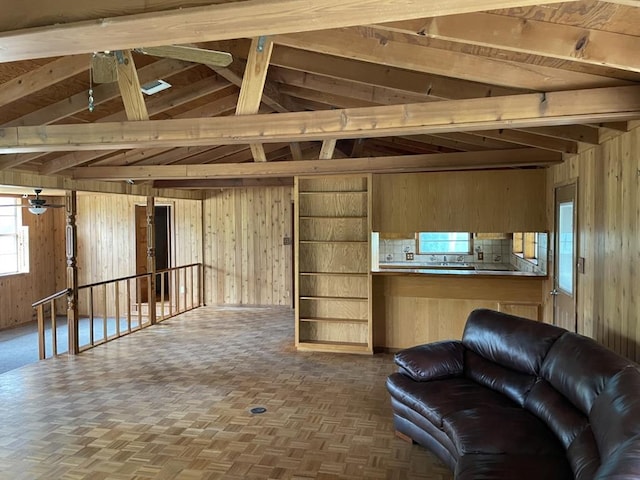 401 County Road 128, Burnet, TX 78611 - living area featuring vaulted ceiling with beams and wood walls