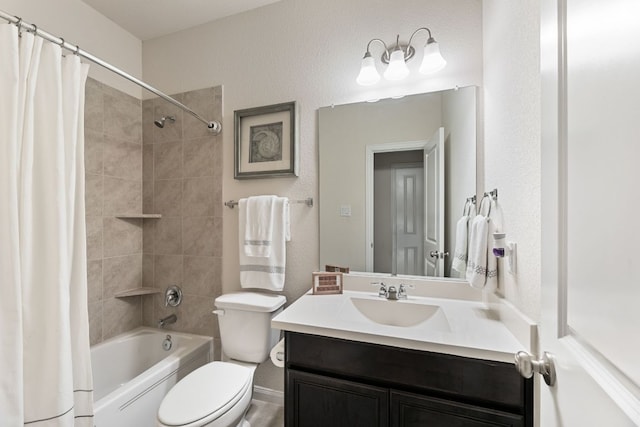 full bath with toilet, shower / bath combo, and vanity