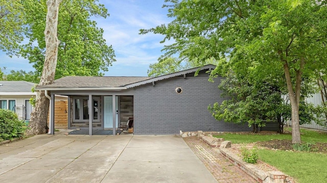 back of house featuring a patio area