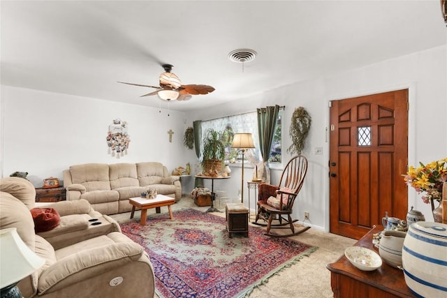 607 Gilmore St, Taylor, TX 76574 - carpeted living area featuring visible vents and ceiling fan