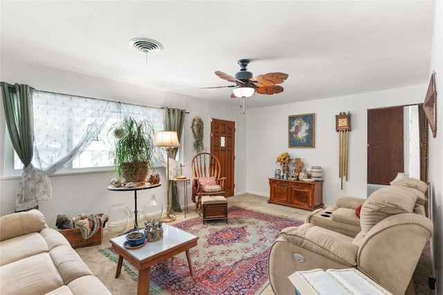 607 Gilmore St, Taylor, TX 76574 - living room with carpet flooring, a ceiling fan, and visible vents