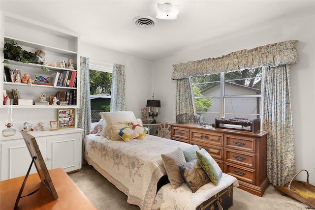 607 Gilmore St, Taylor, TX 76574 - bedroom with light colored carpet and visible vents