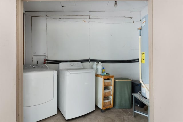 607 Gilmore St, Taylor, TX 76574 - washroom with separate washer and dryer, laundry area, and water heater