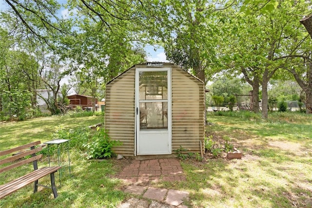607 Gilmore St, Taylor, TX 76574 - view of shed featuring fence