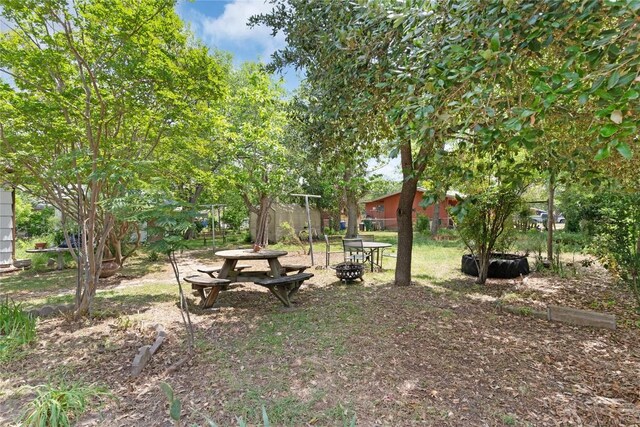 607 Gilmore St, Taylor, TX 76574 - view of yard with fence and a fire pit
