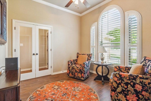 sitting room featuring french doors, ornamental molding, plenty of natural light, and ceiling fan