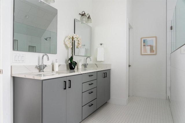 5510 Woodrow Ave Unit 1, Austin, TX 78756 - bathroom with double vanity, tile patterned floors, tiled shower, and a sink