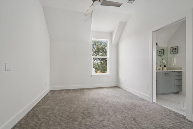 5510 Woodrow Ave Unit 1, Austin, TX 78756 - unfurnished bedroom featuring bar, carpet, connected bathroom, and lofted ceiling