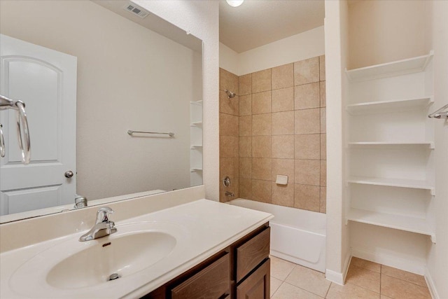 182 Lone Tree Holw, Buda, TX 78610 - bathroom with tile patterned floors, vanity, and bathtub / shower combination