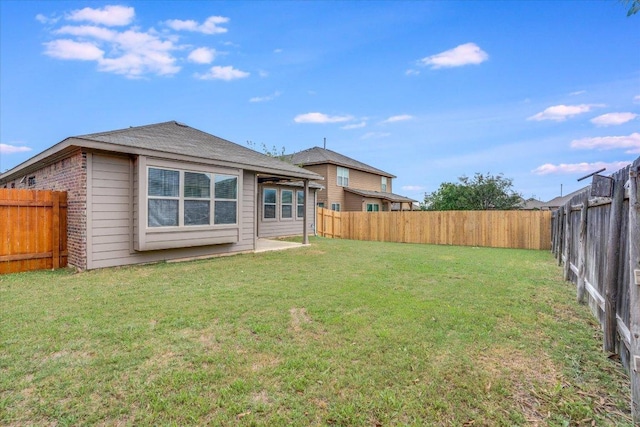 182 Lone Tree Holw, Buda, TX 78610 - back of property featuring brick siding