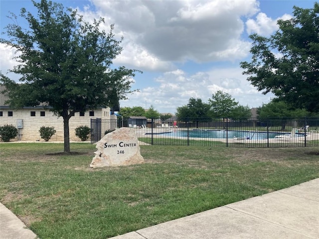 182 Lone Tree Holw, Buda, TX 78610 - surrounding community with a swimming pool