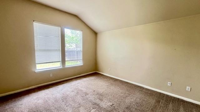 1616 Bowerton Dr, Austin, TX 78754 - carpeted empty room featuring healthy amount of natural light and vaulted ceiling