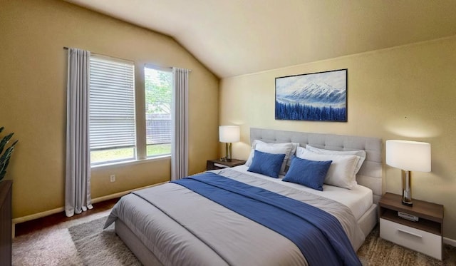 1616 Bowerton Dr, Austin, TX 78754 - carpeted bedroom featuring vaulted ceiling and baseboards