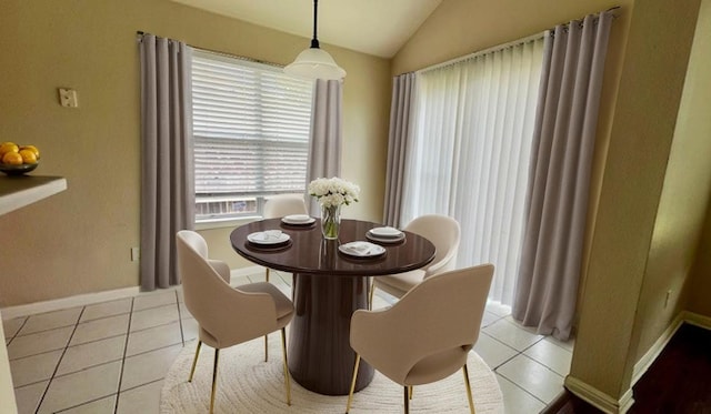 1616 Bowerton Dr, Austin, TX 78754 - dining room featuring vaulted ceiling and light tile patterned floors