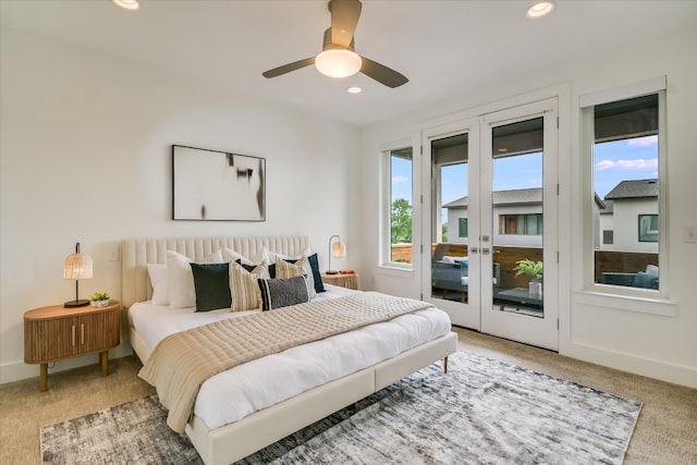 bedroom featuring access to outside, baseboards, recessed lighting, and light carpet