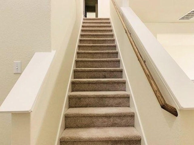 staircase with baseboards