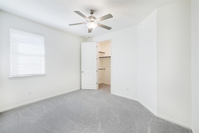 19020 Fernando Trl, Austin, TX 78738 - unfurnished bedroom with carpet, a spacious closet, and baseboards
