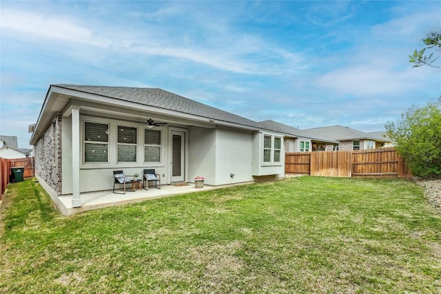19020 Fernando Trl, Austin, TX 78738 - back of property with a ceiling fan, a patio, and stucco siding