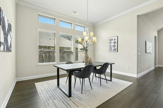 10408 Nicolet Way, Austin, TX 78717 - dining area with a chandelier, crown molding, and dark wood-type flooring