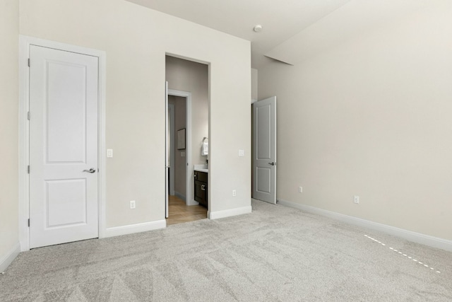 10408 Nicolet Way, Austin, TX 78717 - unfurnished bedroom featuring light carpet and ensuite bath