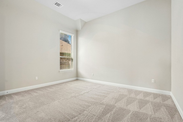10408 Nicolet Way, Austin, TX 78717 - unfurnished room with light carpet, baseboards, and lofted ceiling