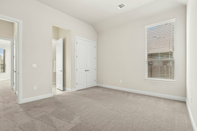 10408 Nicolet Way, Austin, TX 78717 - unfurnished bedroom with carpet, baseboards, and a closet