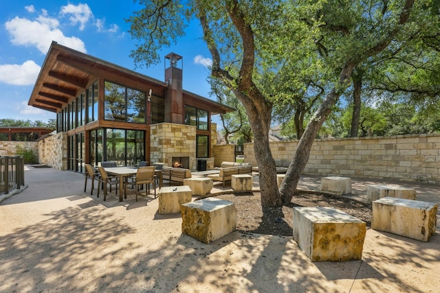 10408 Nicolet Way, Austin, TX 78717 - view of patio with an outdoor stone fireplace