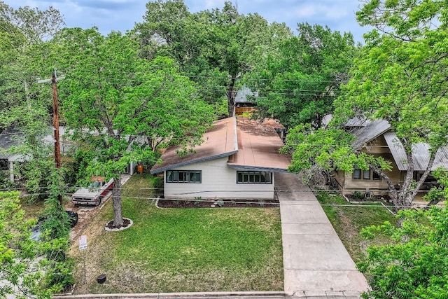 exterior space with a front lawn