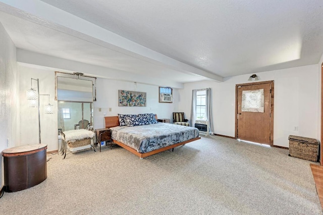 carpeted bedroom with baseboards