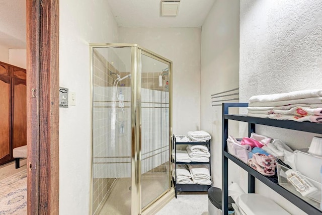 full bathroom with a stall shower