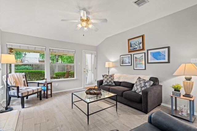 12804 Council Bluff Dr, Austin, TX 78727 - living area with baseboards, lofted ceiling, light wood finished floors, and ceiling fan