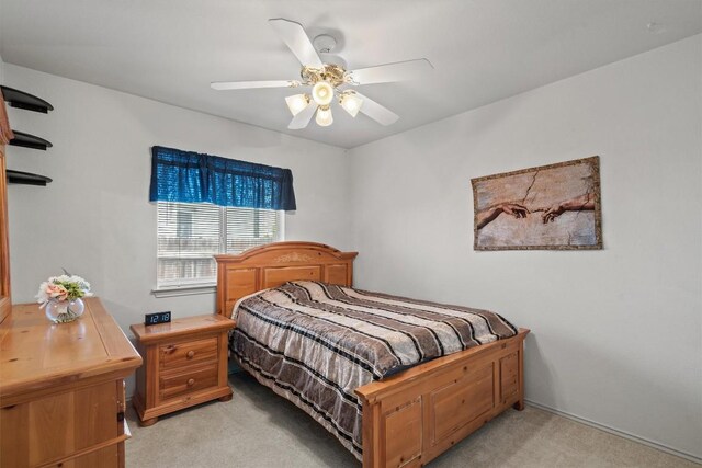 12804 Council Bluff Dr, Austin, TX 78727 - bedroom with light colored carpet and a ceiling fan