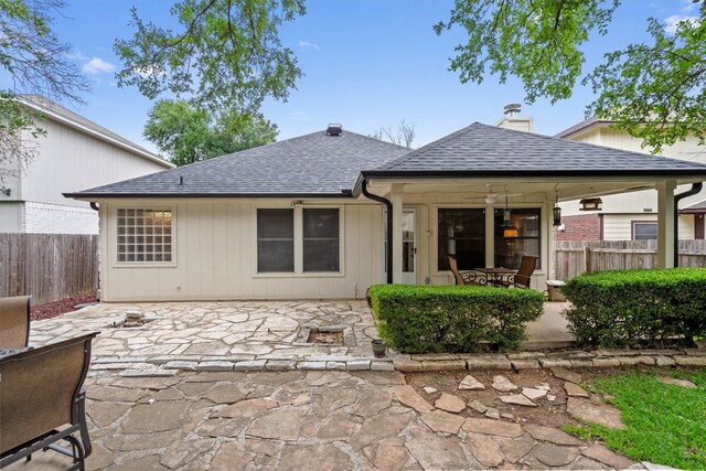 12804 Council Bluff Dr, Austin, TX 78727 - rear view of house featuring a patio and a shingled roof