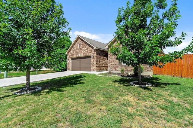 view of front of home featuring fence, a front lawn, brick siding, a garage, and concrete driveway