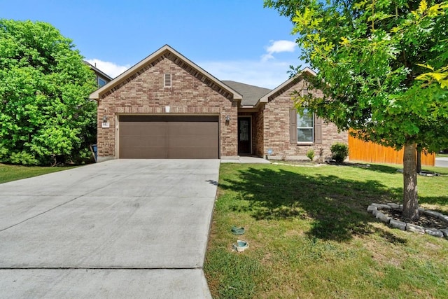 view of front of property featuring a garage, concrete driveway, a front yard, and brick siding