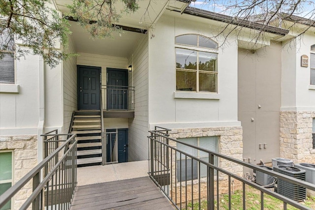 6000 Shepherd Mountain Cv Unit 2007, Austin, TX 78730 - doorway to property with stone siding and stucco siding