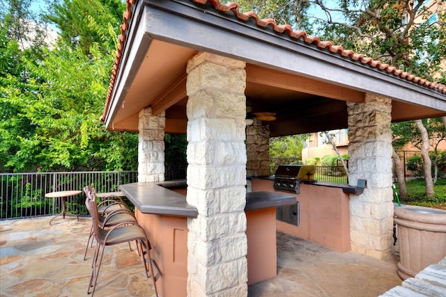 6000 Shepherd Mountain Cv Unit 2007, Austin, TX 78730 - view of patio with an outdoor kitchen, grilling area, a gazebo, and fence