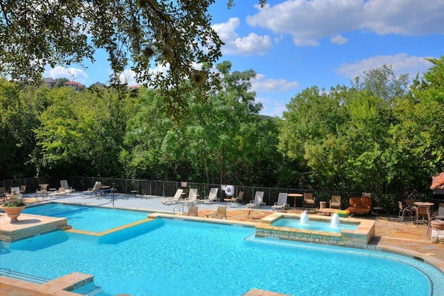 6000 Shepherd Mountain Cv Unit 2007, Austin, TX 78730 - community pool with fence, a patio, and a hot tub