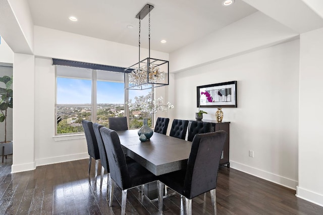 1304 High Lonesome, Leander, TX 78641 - dining area with a chandelier, baseboards, dark wood-style floors, and recessed lighting