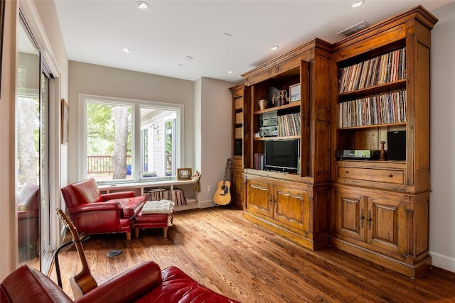 4801 Balcones Dr, Austin, TX 78731 - sitting room with wood finished floors, recessed lighting, and baseboards