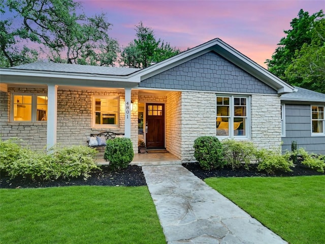 4801 Balcones Dr, Austin, TX 78731 - view of front of home featuring a front yard and covered porch