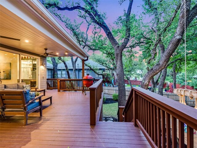 4801 Balcones Dr, Austin, TX 78731 - deck at dusk with a fenced backyard and an outdoor hangout area