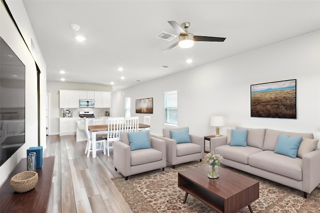 1208 Tipton St, Georgetown, TX 78633 - living room featuring recessed lighting, ceiling fan, and light wood-type flooring