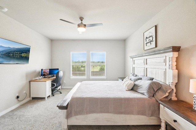 1208 Tipton St, Georgetown, TX 78633 - bedroom with carpet flooring, a desk, a ceiling fan, and baseboards