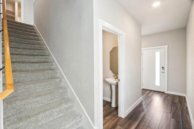 1208 Tipton St, Georgetown, TX 78633 - foyer featuring stairs, dark wood finished floors, and baseboards