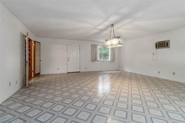 1402 Brown St, San Marcos, TX 78666 - spare room with a wall unit AC